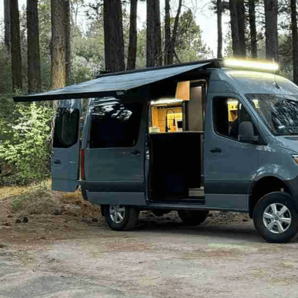 VanTrix electric side-mounted awning installed on camper van for premium outdoor patio area