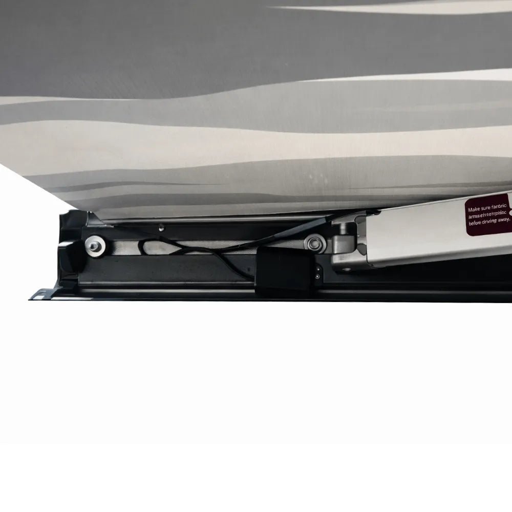 VanTrix automated awning extended showing powered shade system for high-end Sprinter, Transit, and ProMaster builds