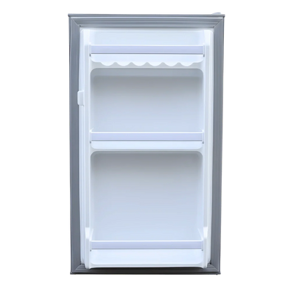 Open van refrigerator door with built-in shelves and bottle rack, white interior.