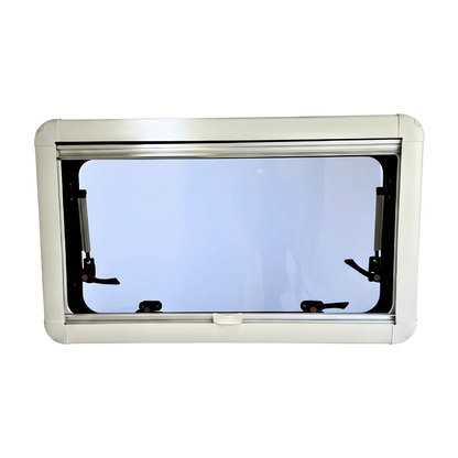 Rectangular van window with white frame and black latches for camper or RV conversion