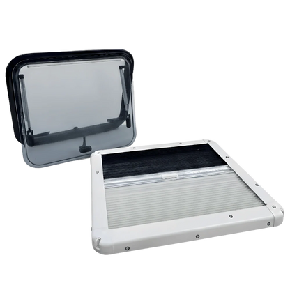 Van roof vent window with tinted cover and integrated shade, isolated on white