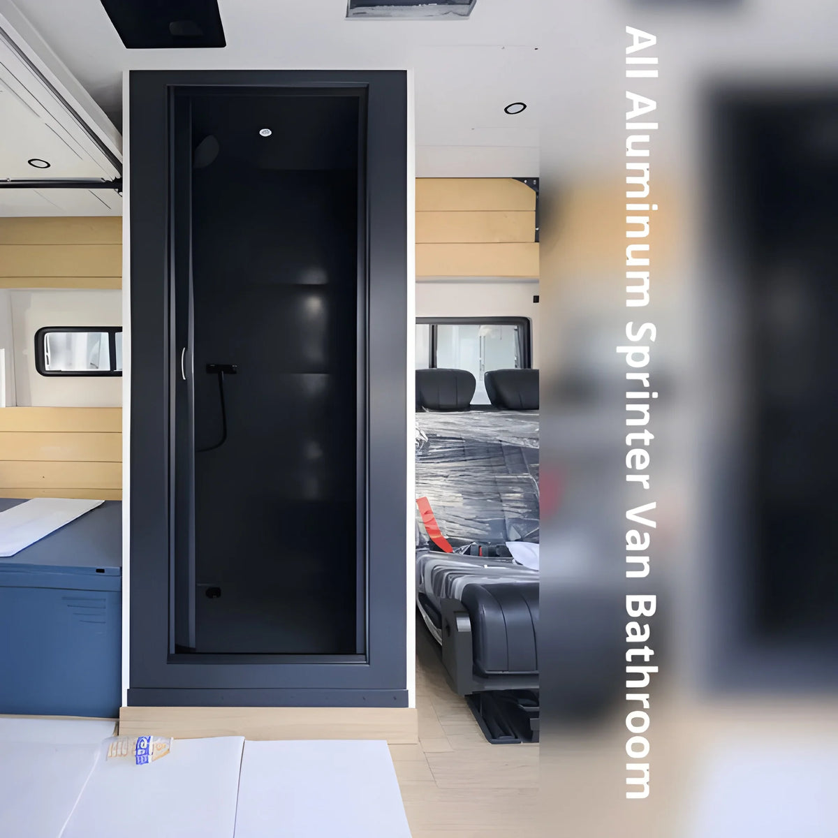 Charcoal Vankea L aluminum shower installed inside a Sprinter camper van, with a handheld shower and recessed ceiling light.