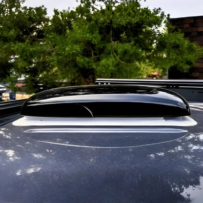 Cryonex RV roof ventilation fan installed on a van roof with its black exterior lid closed.