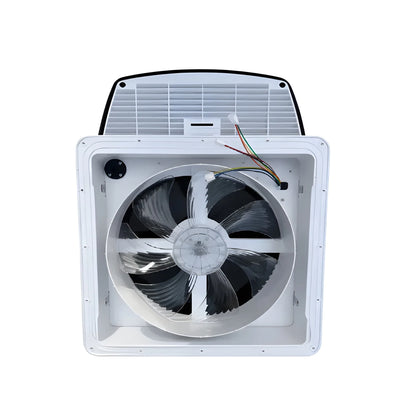 Underside of the Cryonex RV roof ventilation fan showing fan blades, white housing and wiring connectors.