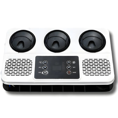 Cryonex X700 12V rooftop air conditioner interior plenum with three adjustable air vents and a central control panel.