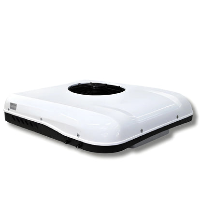 Front angled view of the Cryonex X700 12V rooftop air conditioner with white exterior cover and black base.
