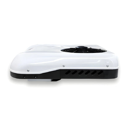 Side view of the Cryonex X700 camper van rooftop AC unit showing the white cover and ventilation openings.