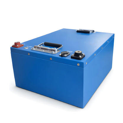 Three-quarter view of the VanTrix 12V 600Ah LiFePO4 deep cycle battery showing its blue case, carrying handles and top terminals.
